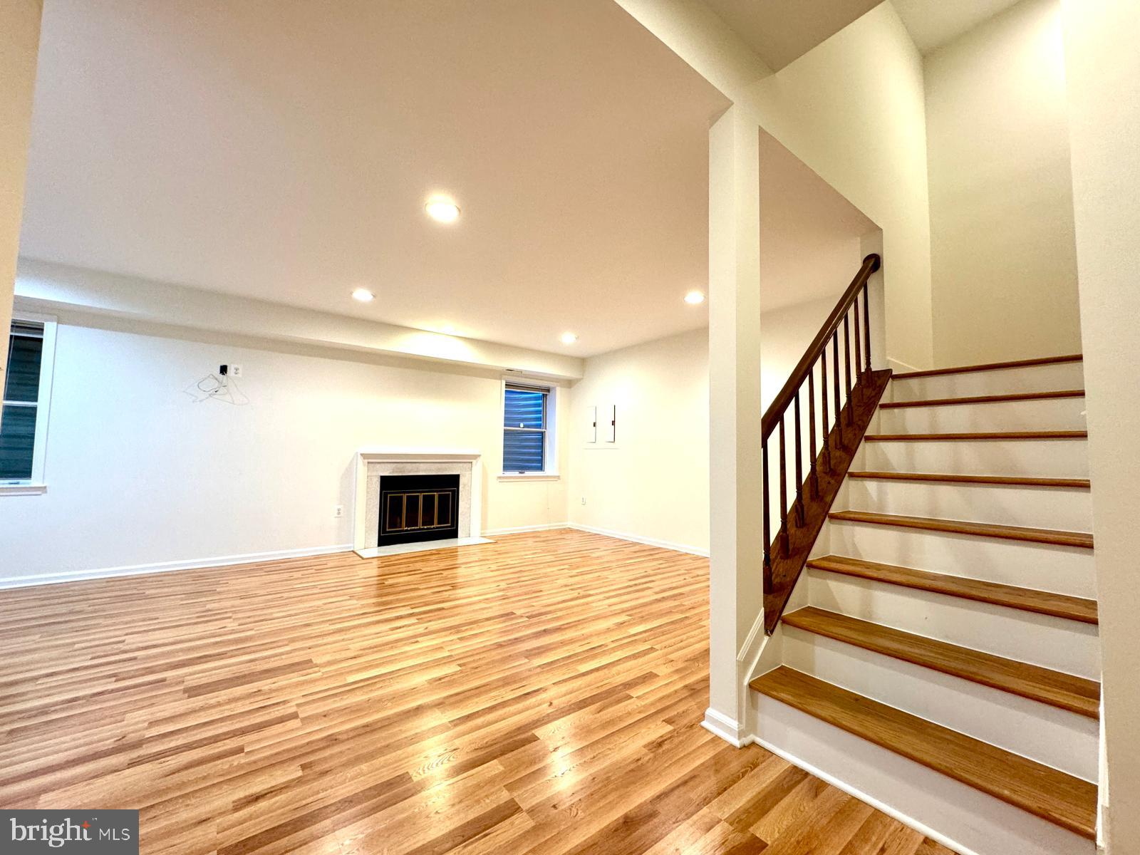 1447 Hampton Hill Circle McLean, VA 22101 - Photo 38 of 46 a view of a livingroom with wooden floor and staircase