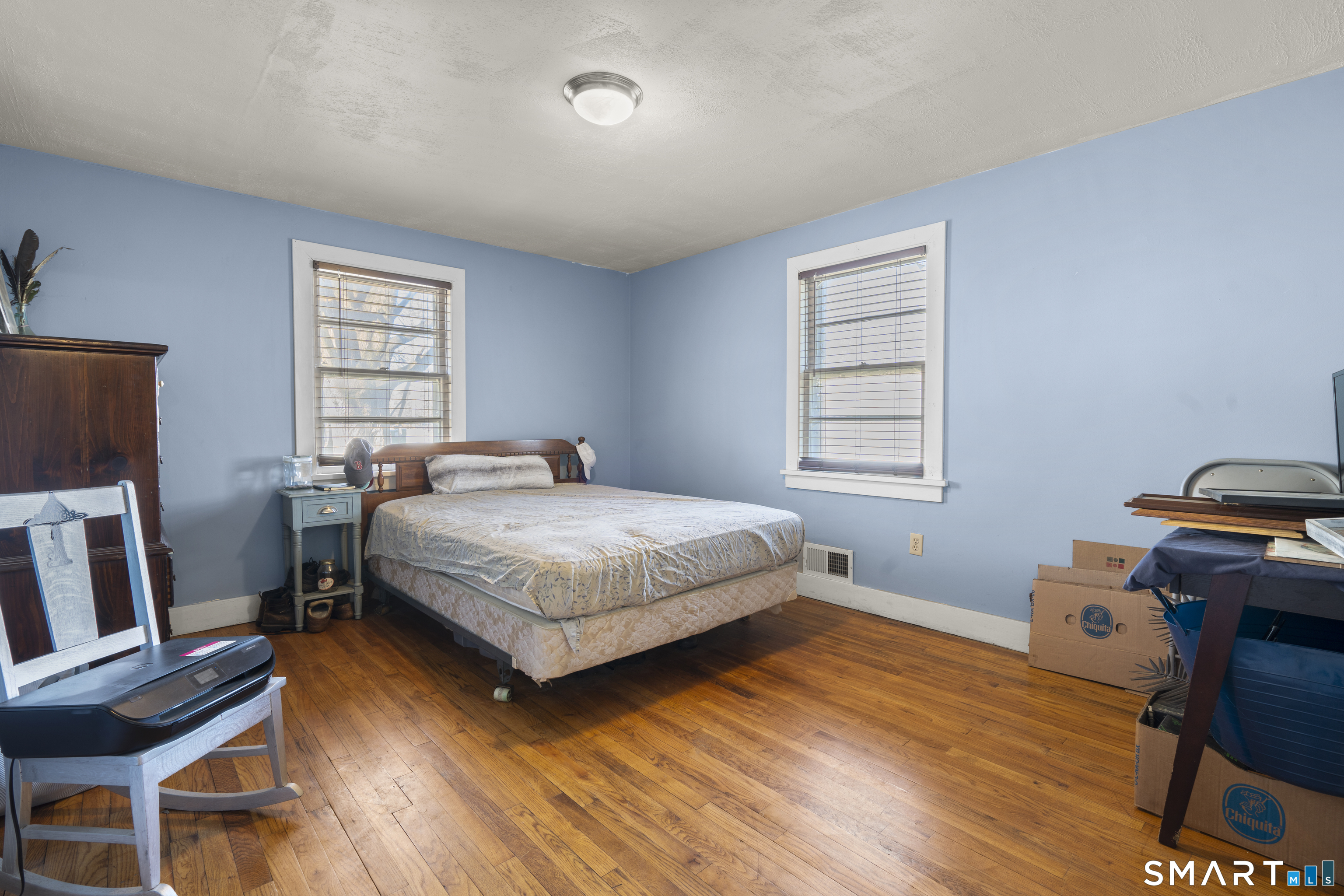 24 East Main Street North Canaan, CT 06018 - Photo 11 of 31 a bedroom with a bed and a window