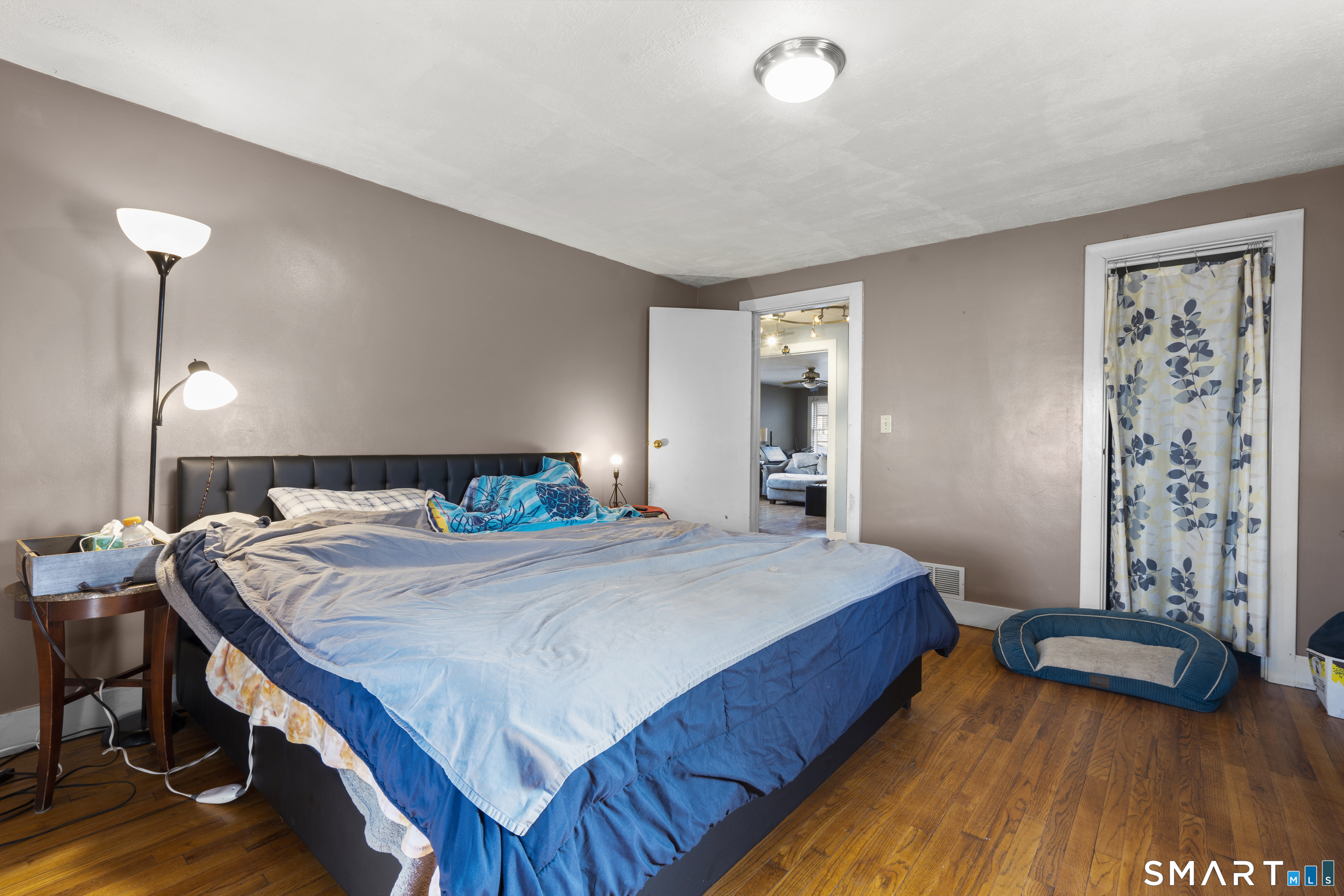 24 East Main Street North Canaan, CT 06018 - Photo 15 of 31 a bedroom with a bed and a wooden floor