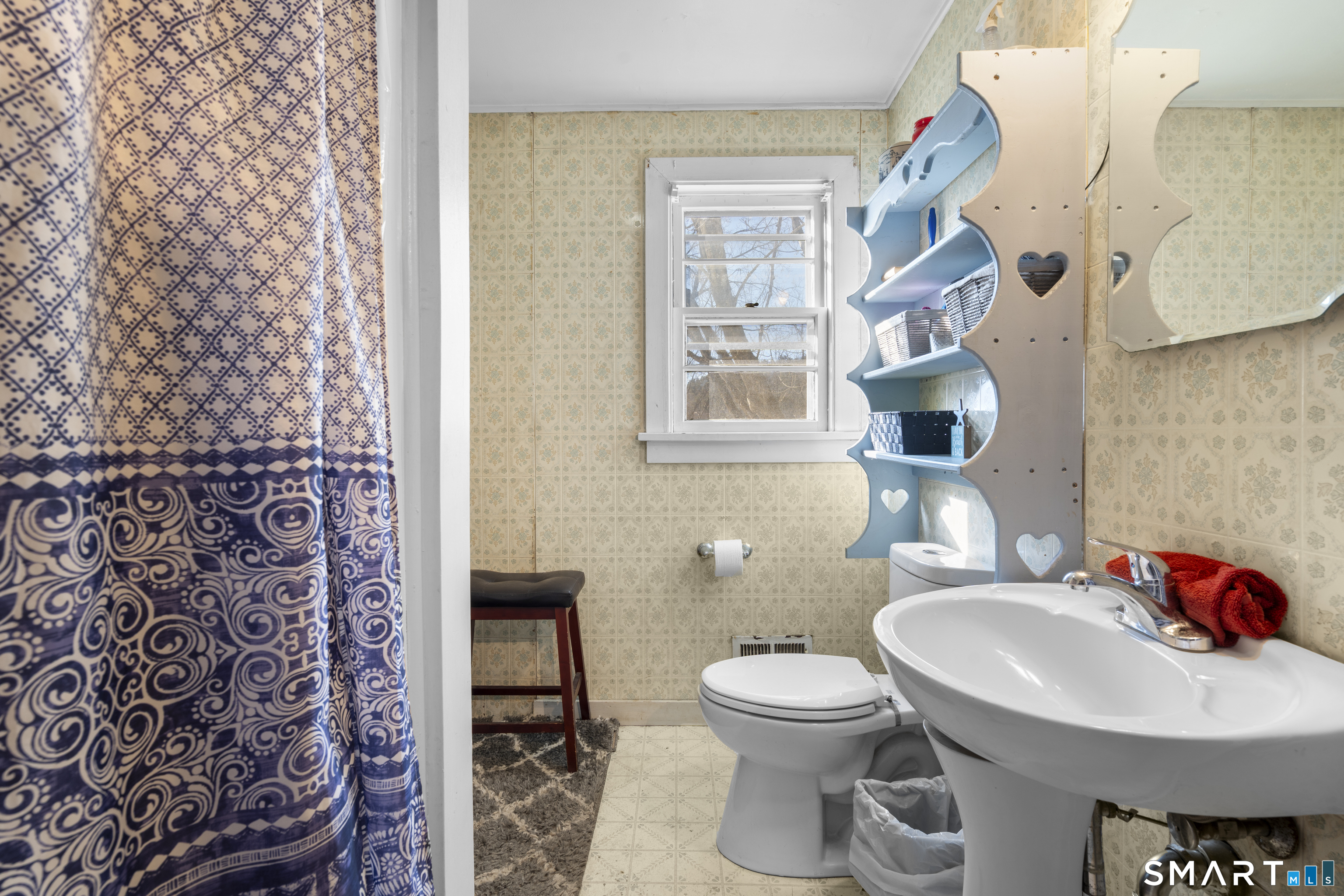 24 East Main Street North Canaan, CT 06018 - Photo 16 of 31 a bathroom with a sink toilet and a mirror