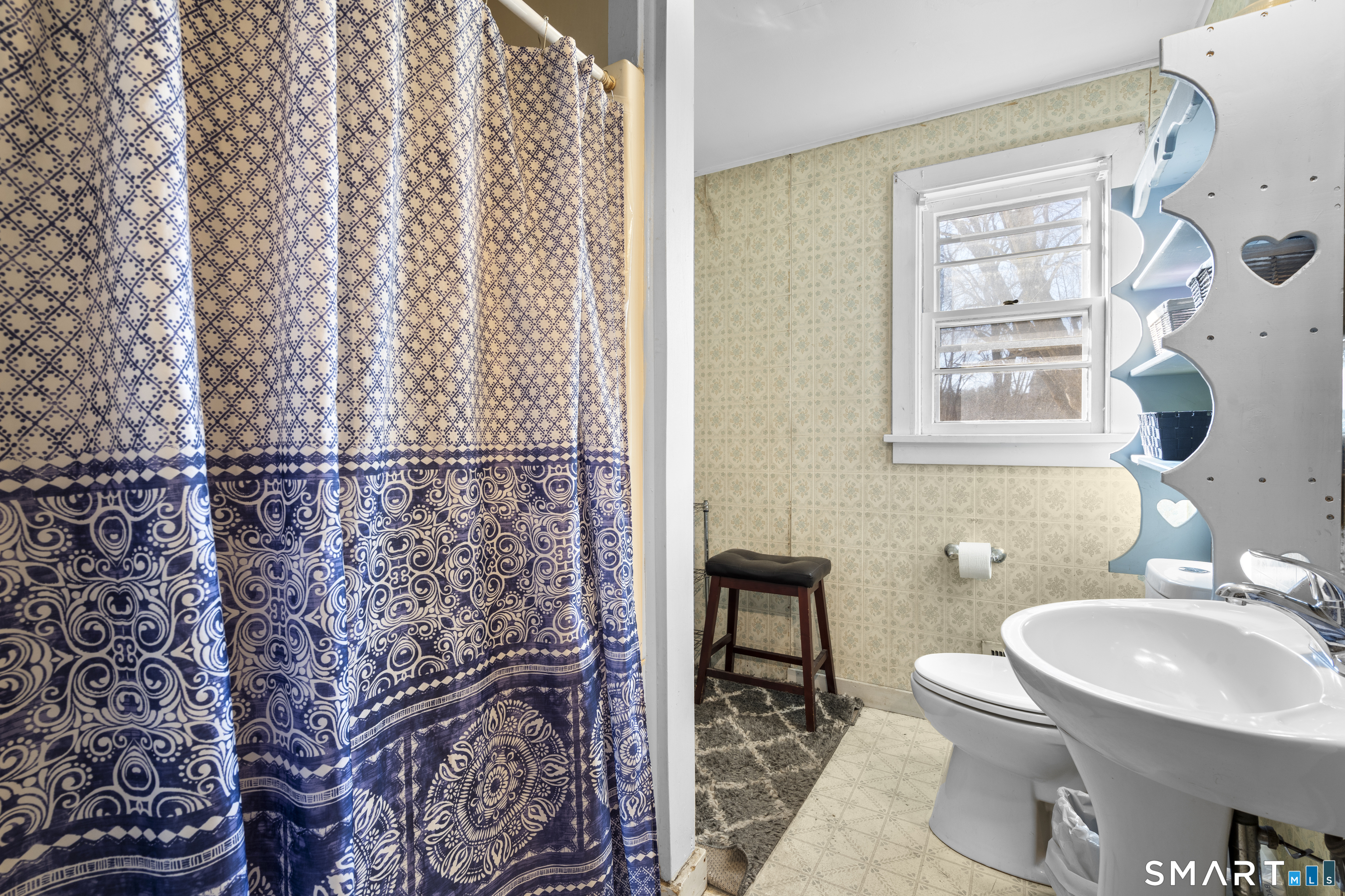 24 East Main Street North Canaan, CT 06018 - Photo 17 of 31 a bathroom with a sink toilet and a mirror