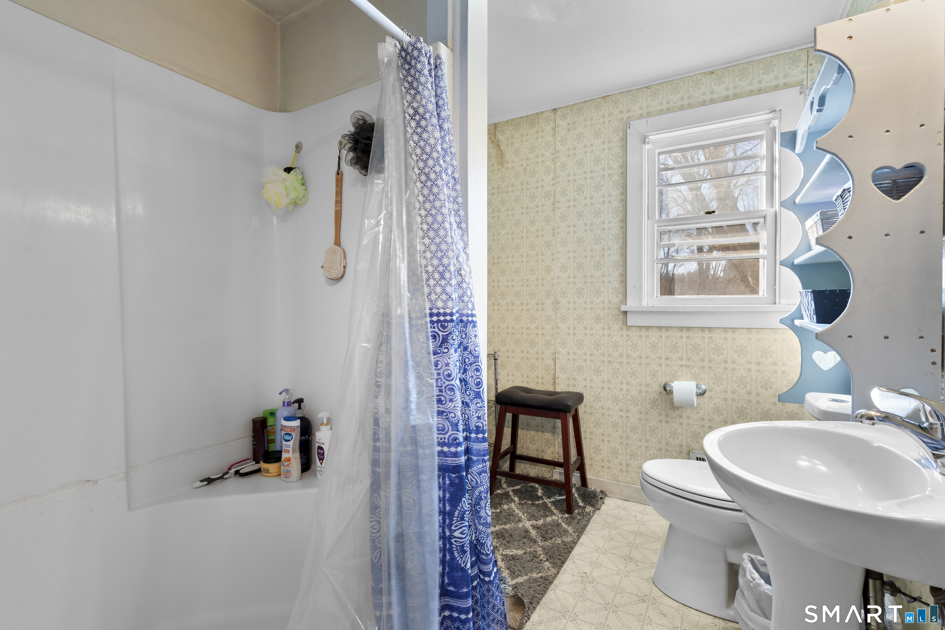 24 East Main Street North Canaan, CT 06018 - Photo 18 of 31 a bathroom with a sink toilet and shower