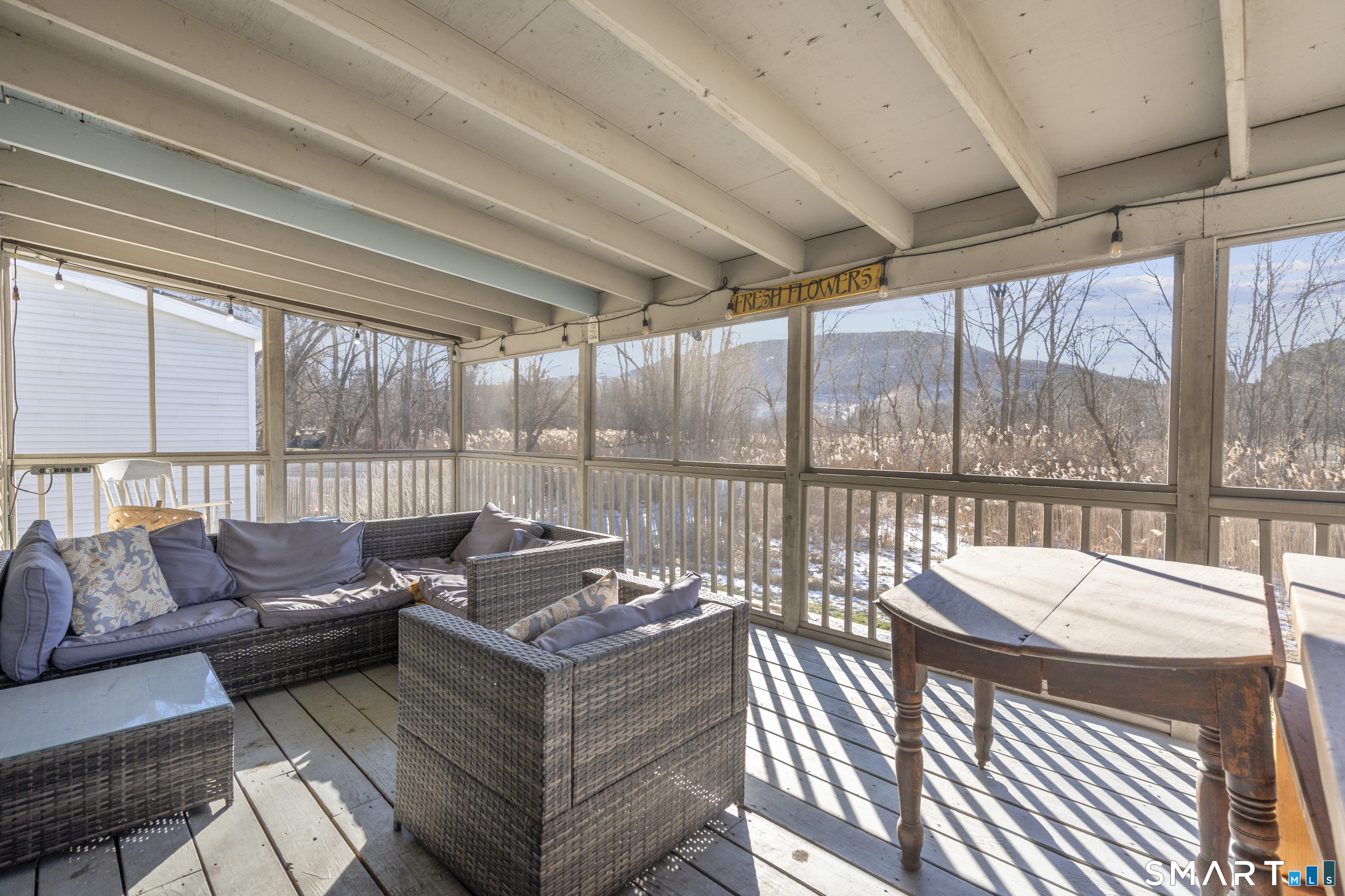 24 East Main Street North Canaan, CT 06018 - Photo 22 of 31 a living room with furniture and a large window