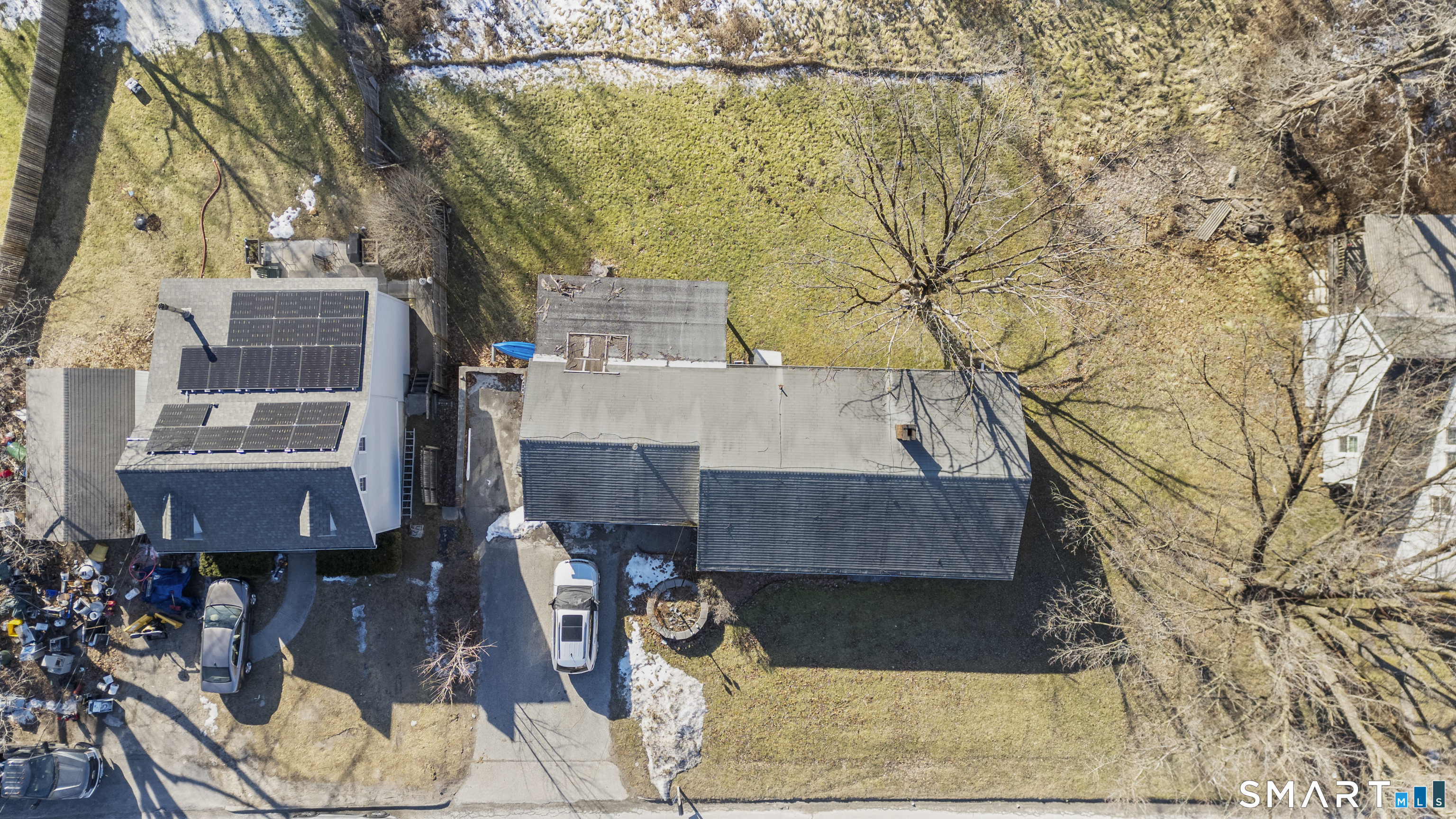 24 East Main Street North Canaan, CT 06018 - Photo 29 of 31 a view of house with a large tree and wooden fence