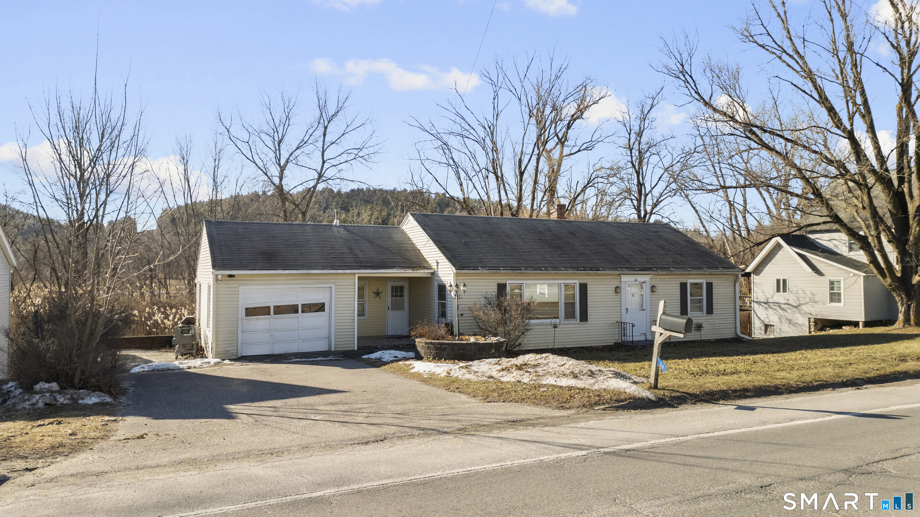 24 East Main Street North Canaan, CT 06018 - Photo 30 of 31 a front view of a house with a yard