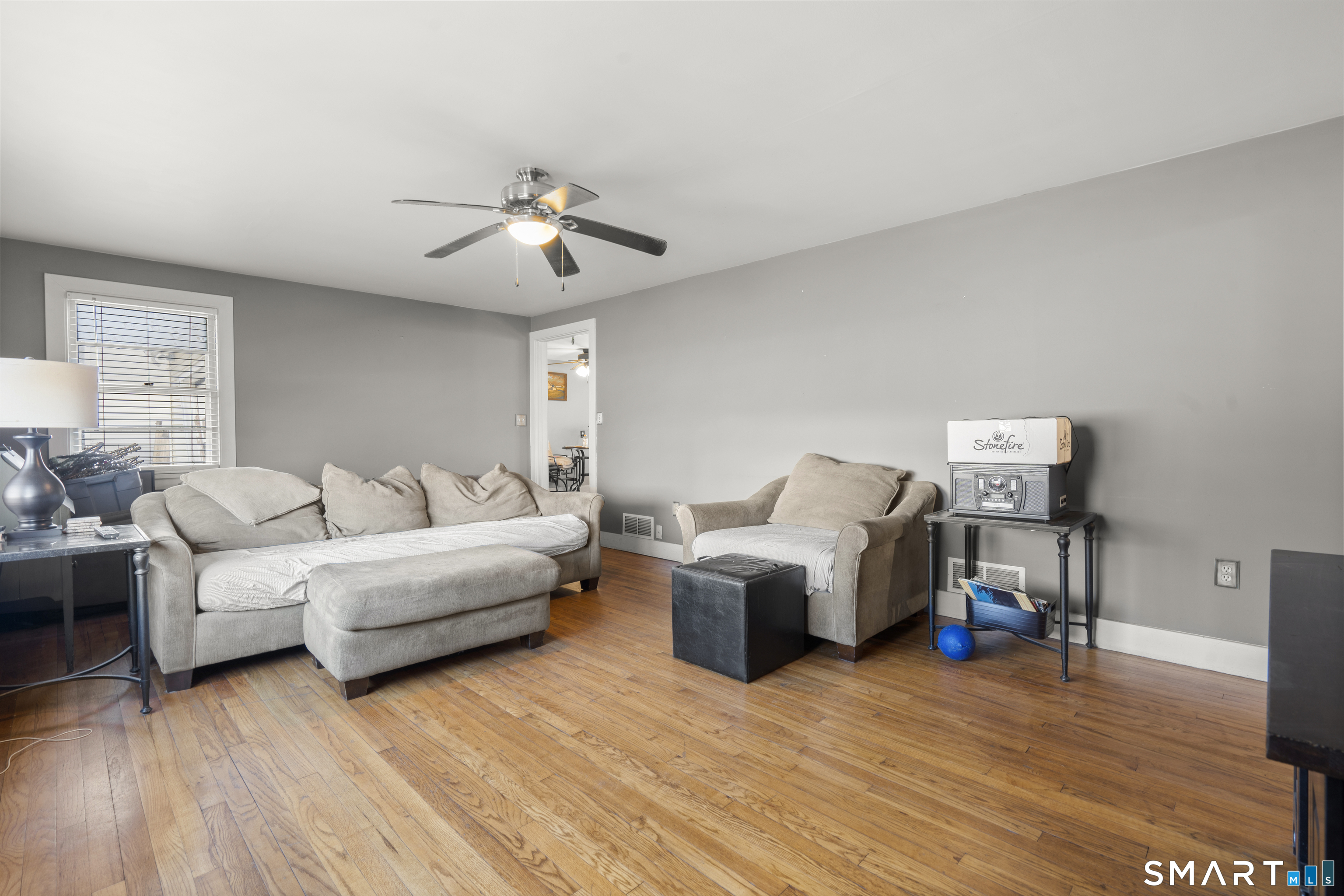 24 East Main Street North Canaan, CT 06018 - Photo 4 of 31 a living room with furniture and a wooden floor