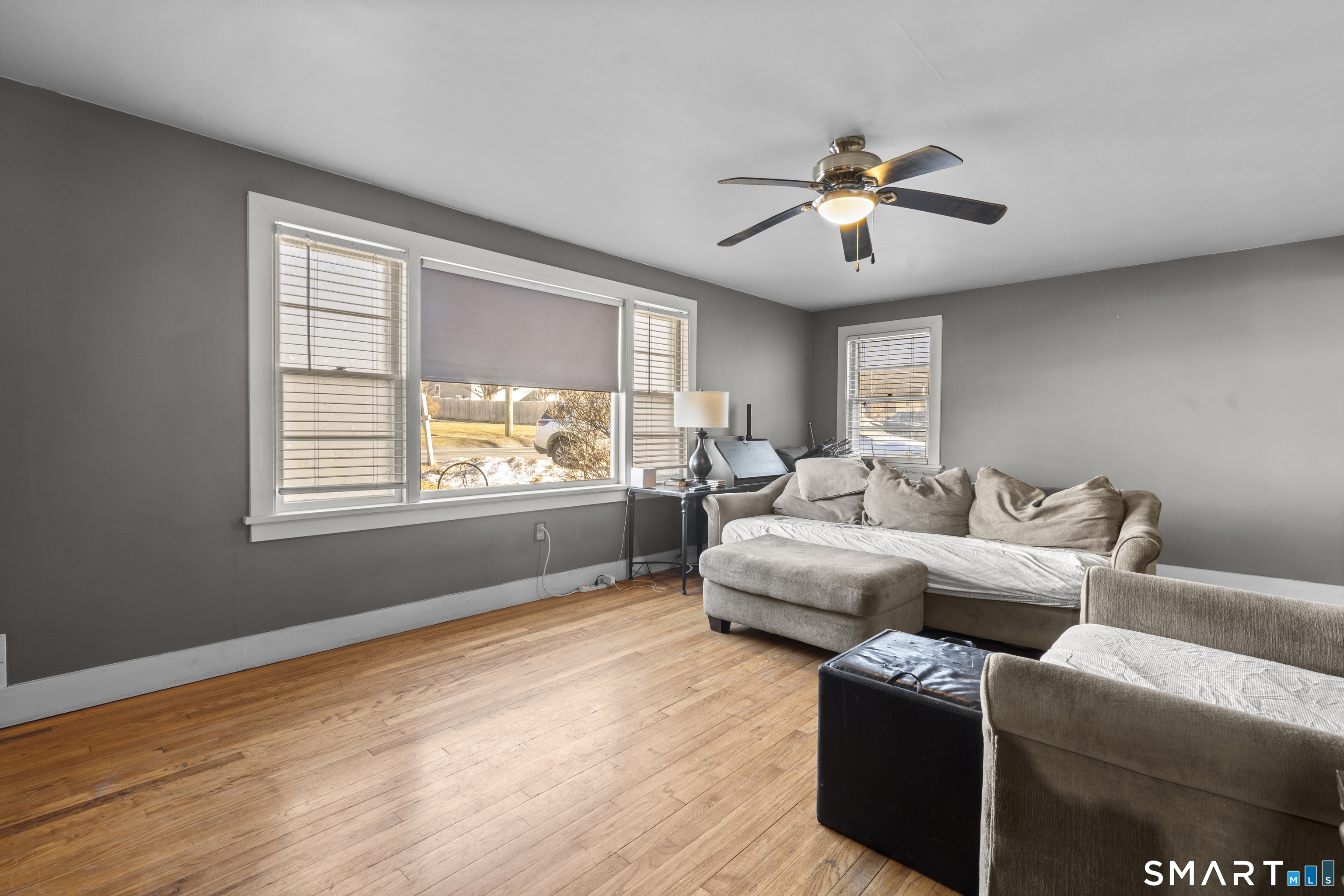 24 East Main Street North Canaan, CT 06018 - Photo 6 of 31 a living room with furniture and a window