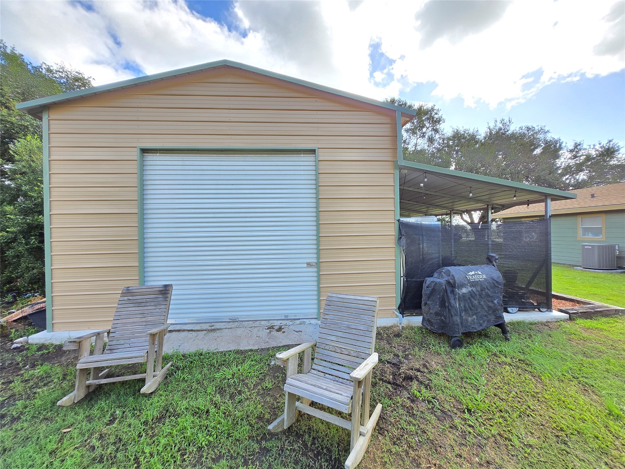 610 East Division Street Edna, TX 77957 - Photo 12 of 38 a backyard of a house with seating space