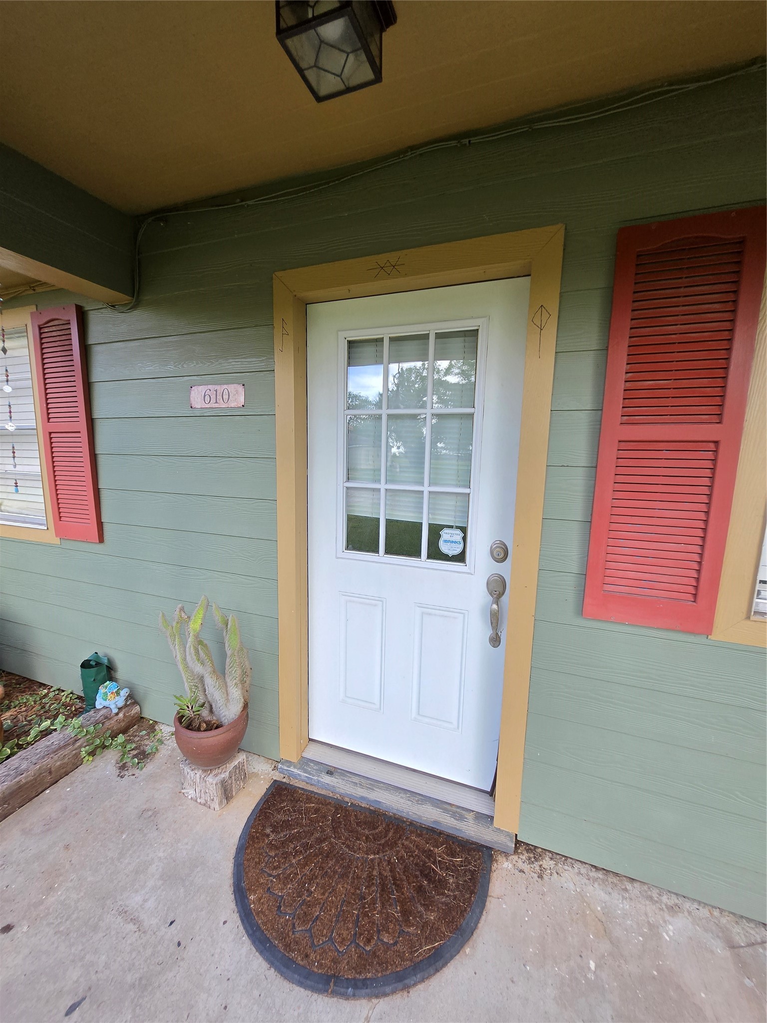 610 East Division Street Edna, TX 77957 - Photo 16 of 38 a view of a door and chair in a room