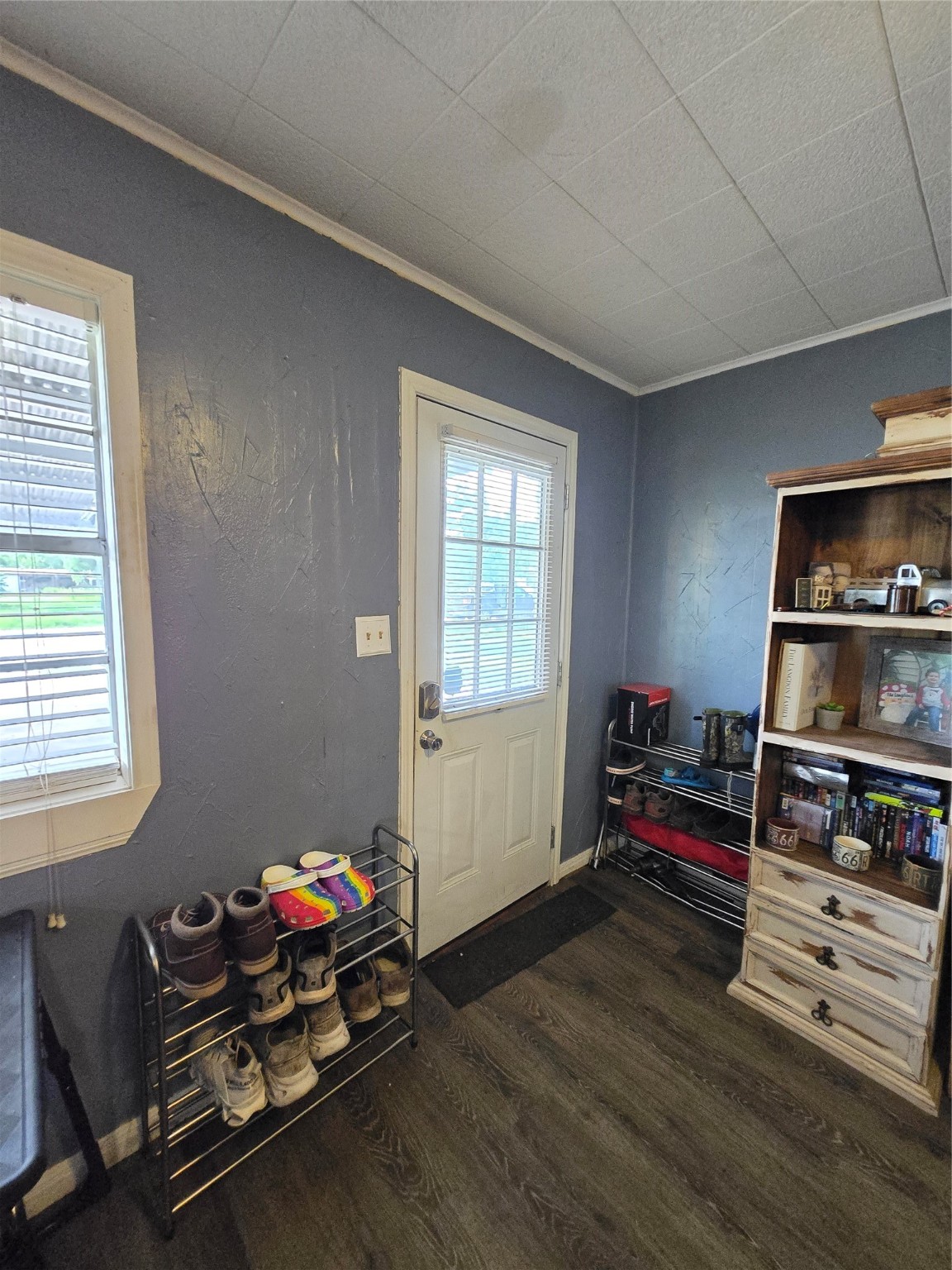 610 East Division Street Edna, TX 77957 - Photo 18 of 38 a bedroom with furniture and a wooden floor