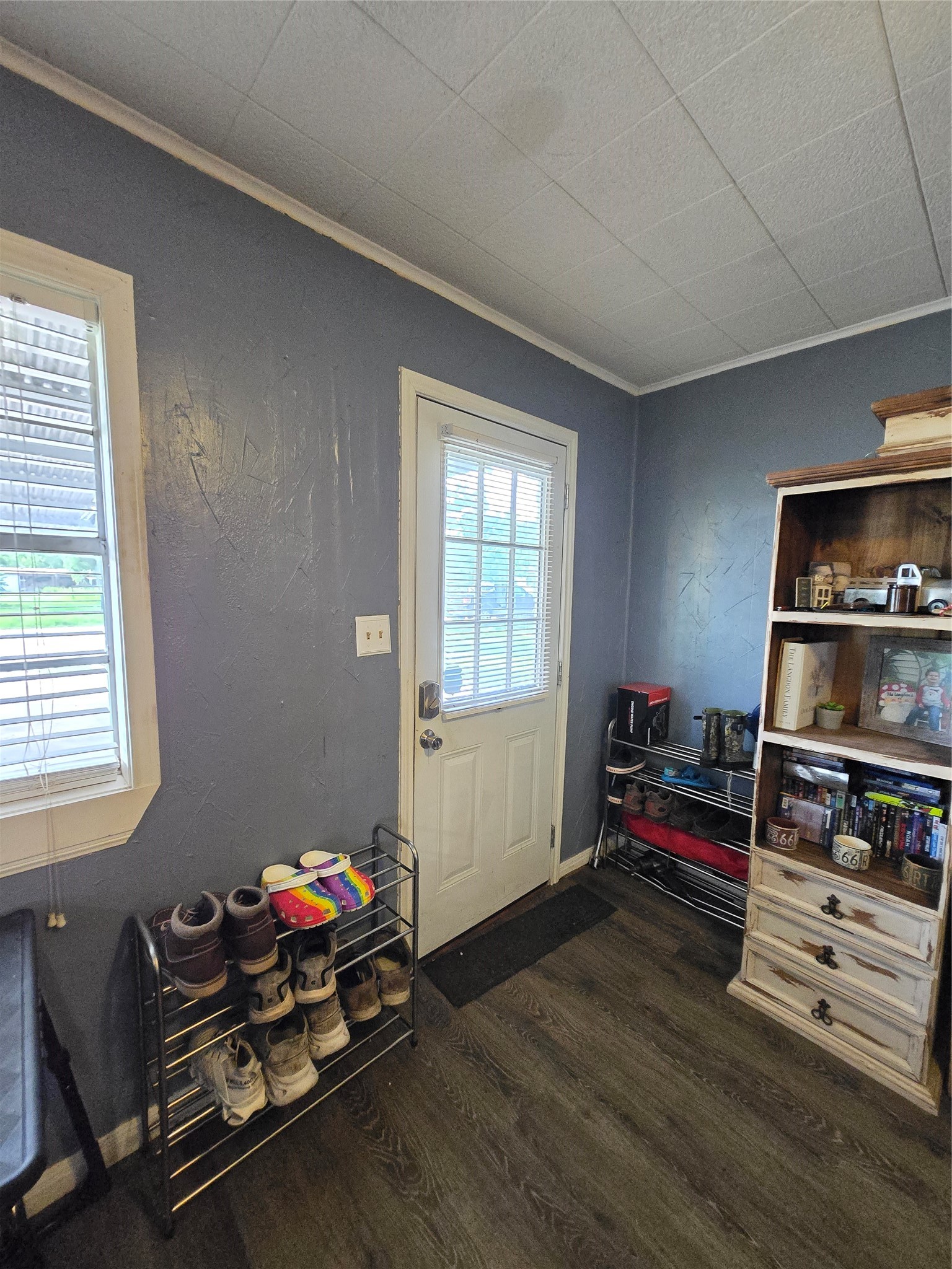 610 East Division Street Edna, TX 77957 - Photo 18 of 38 a bedroom with furniture and a wooden floor