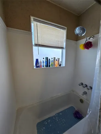 a bathroom with a bathtub
