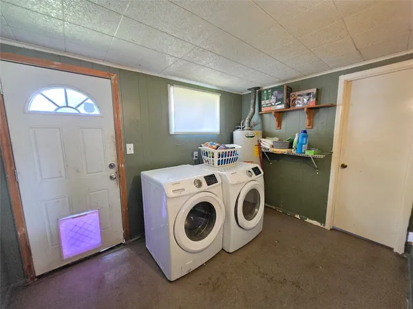 a utility room with dryer and washer