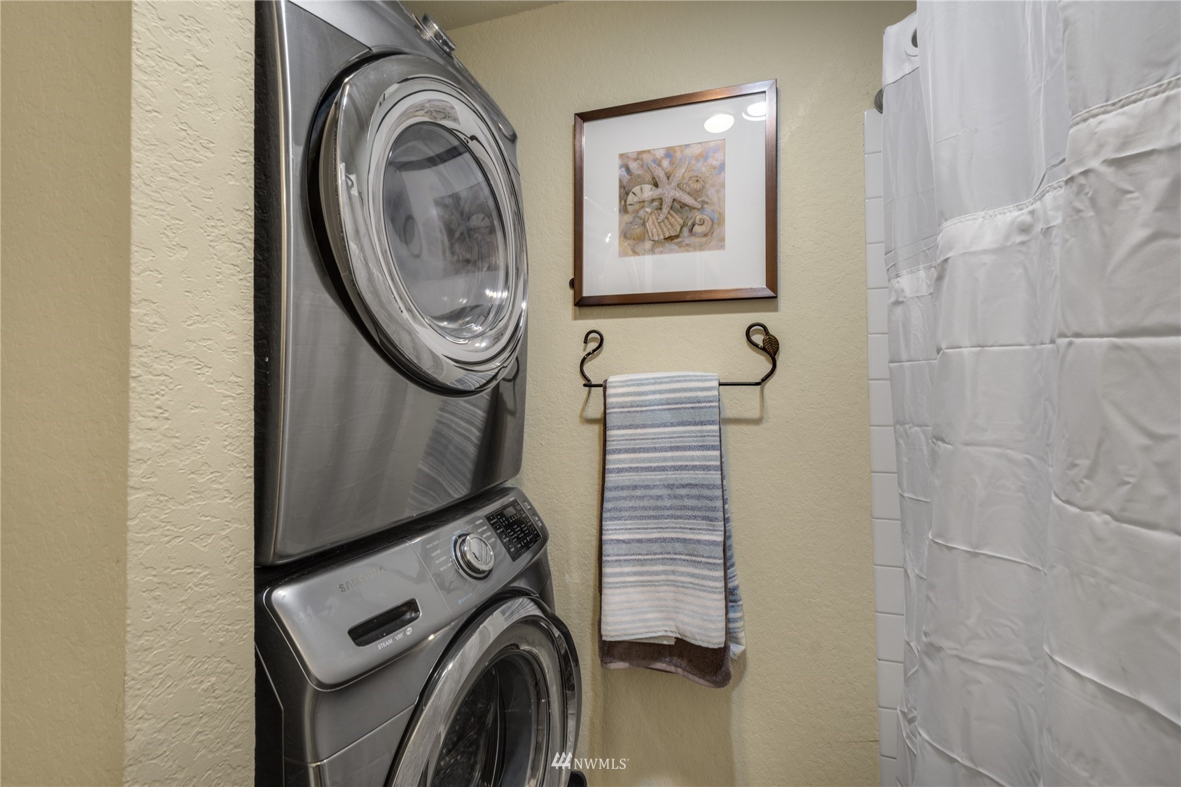 4100 Lake Washington Boulevard North, Unit D203 Renton, WA 98056 - Photo 25 of 30 a utility room with dryer and washer