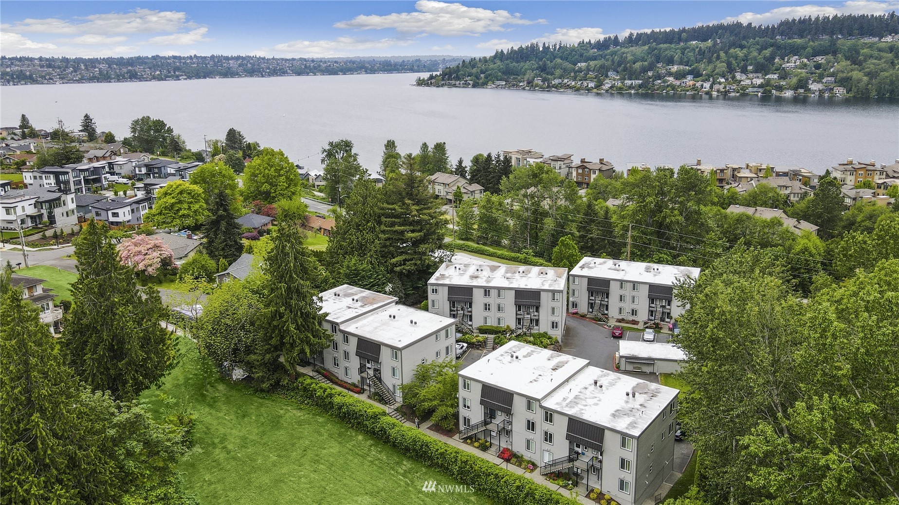 4100 Lake Washington Boulevard North, Unit D203 Renton, WA 98056 - Photo 30 of 30 an aerial view of a house with a lake view