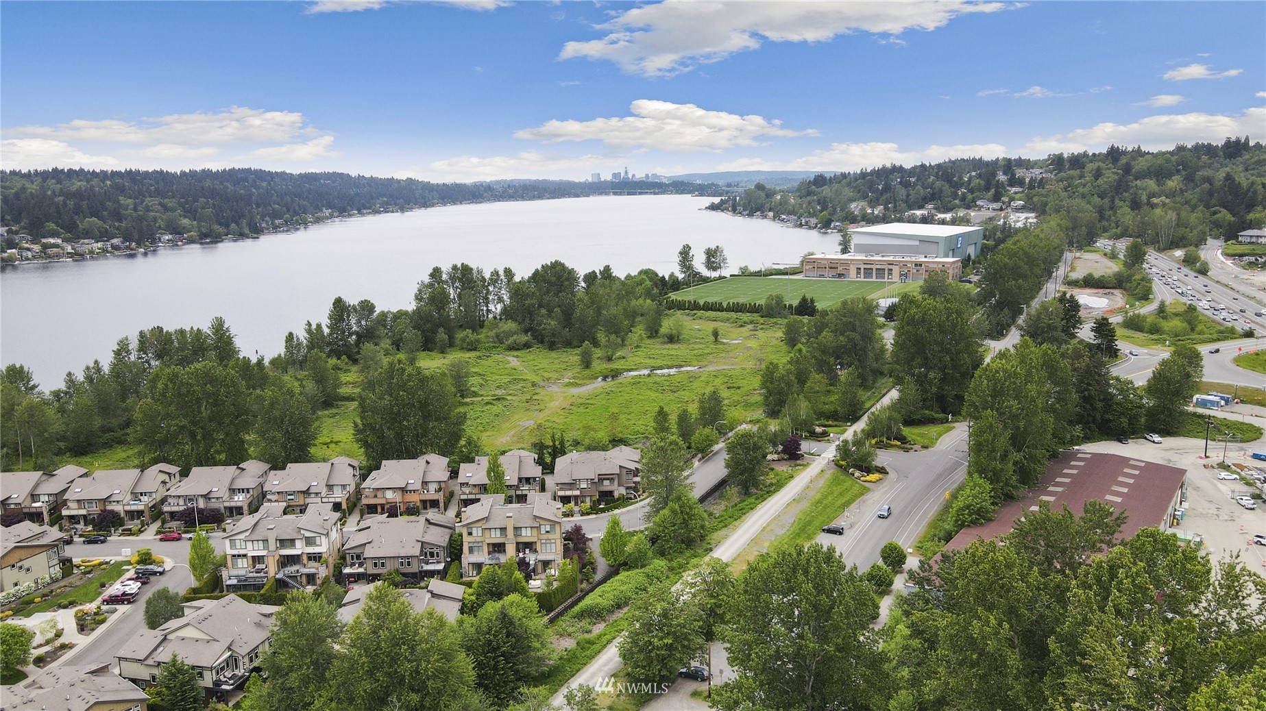 4100 Lake Washington Boulevard North, Unit D203 Renton, WA 98056 - Photo 3 of 30 a view of lake and mountain