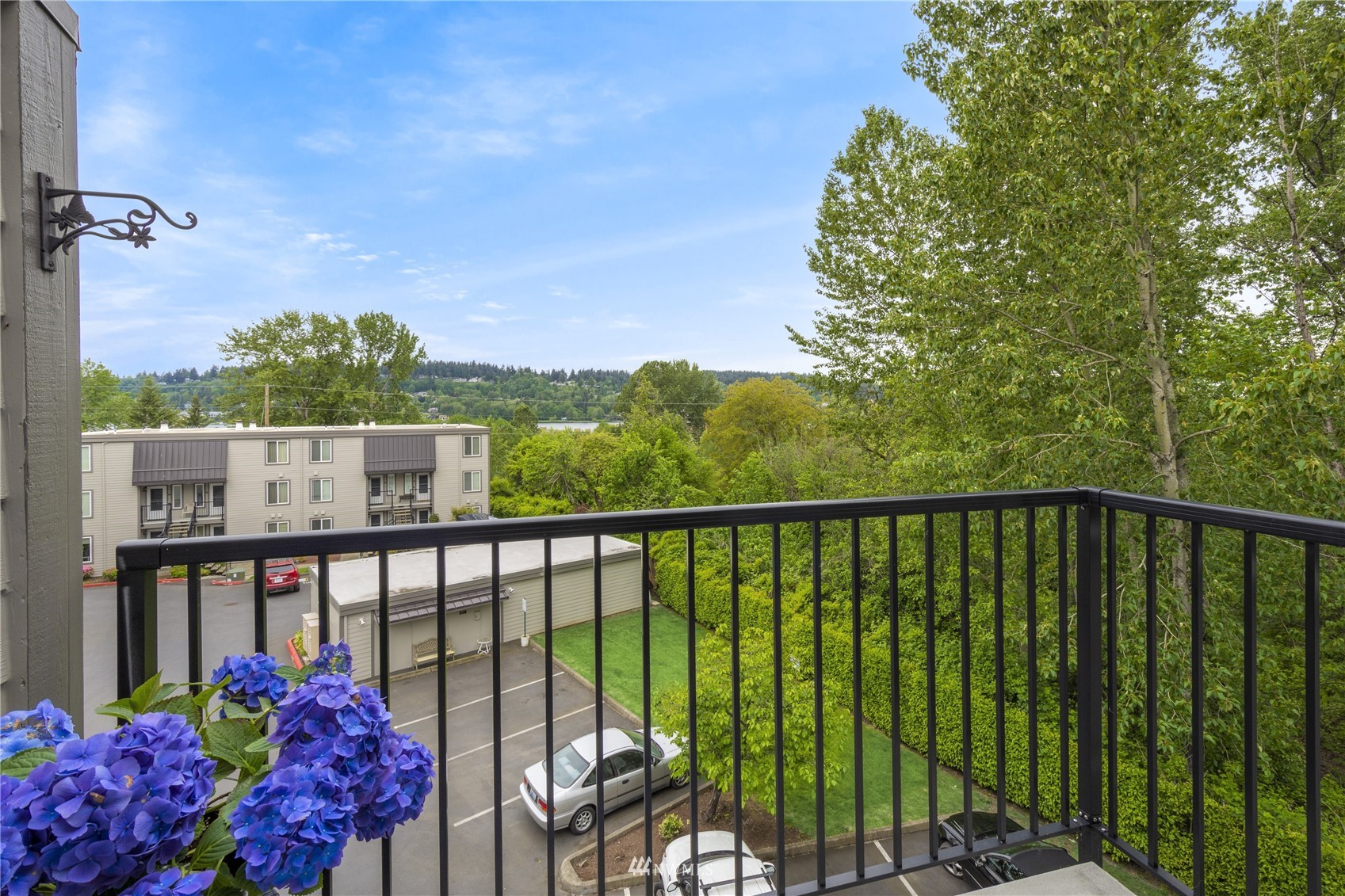 4100 Lake Washington Boulevard North, Unit D203 Renton, WA 98056 - Photo 5 of 30 a view of a balcony with furniture