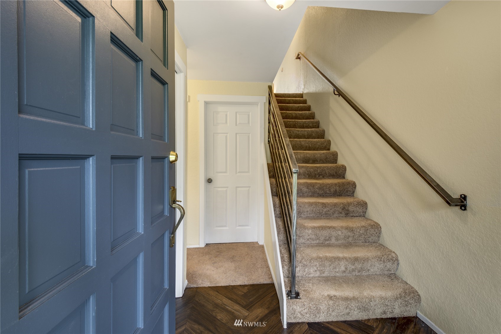 4100 Lake Washington Boulevard North, Unit D203 Renton, WA 98056 - Photo 6 of 30 a view of entryway and hall with wooden floor