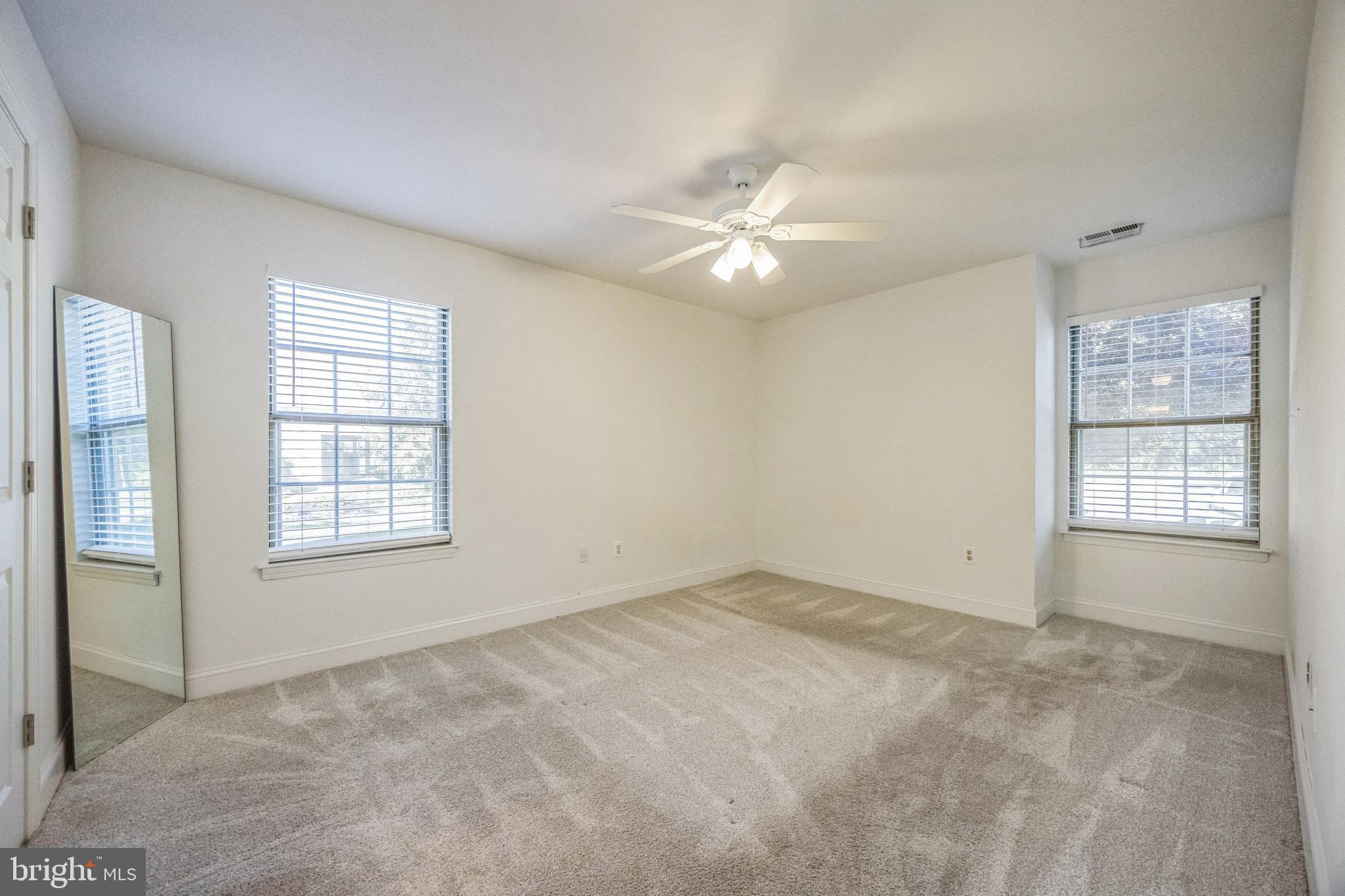 180 Tavistock Road Cherry Hill, NJ 08034 - Photo 9 of 15 a view of an empty room with a window