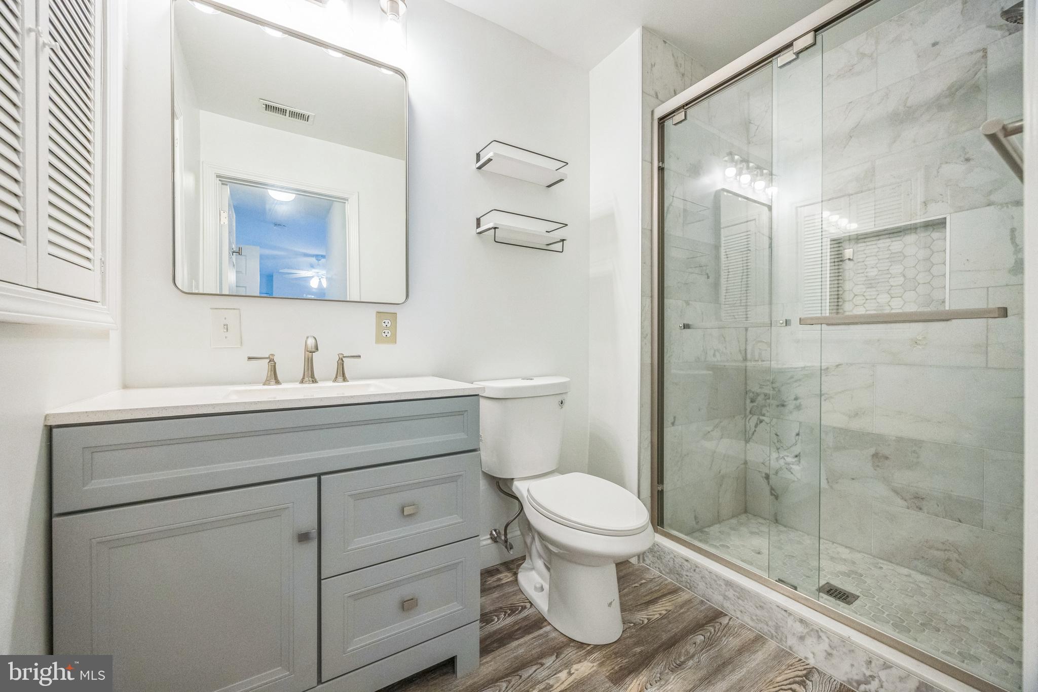 180 Tavistock Road Cherry Hill, NJ 08034 - Photo 10 of 15 a bathroom with a sink toilet and shower