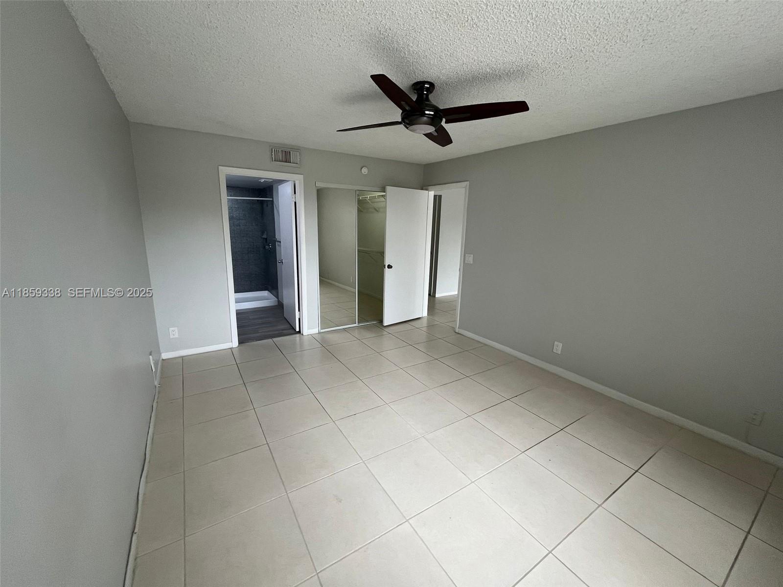 8821 Wiles Road, Unit 203 Coral Springs, FL 33067 - Photo 6 of 30 a view of an empty room