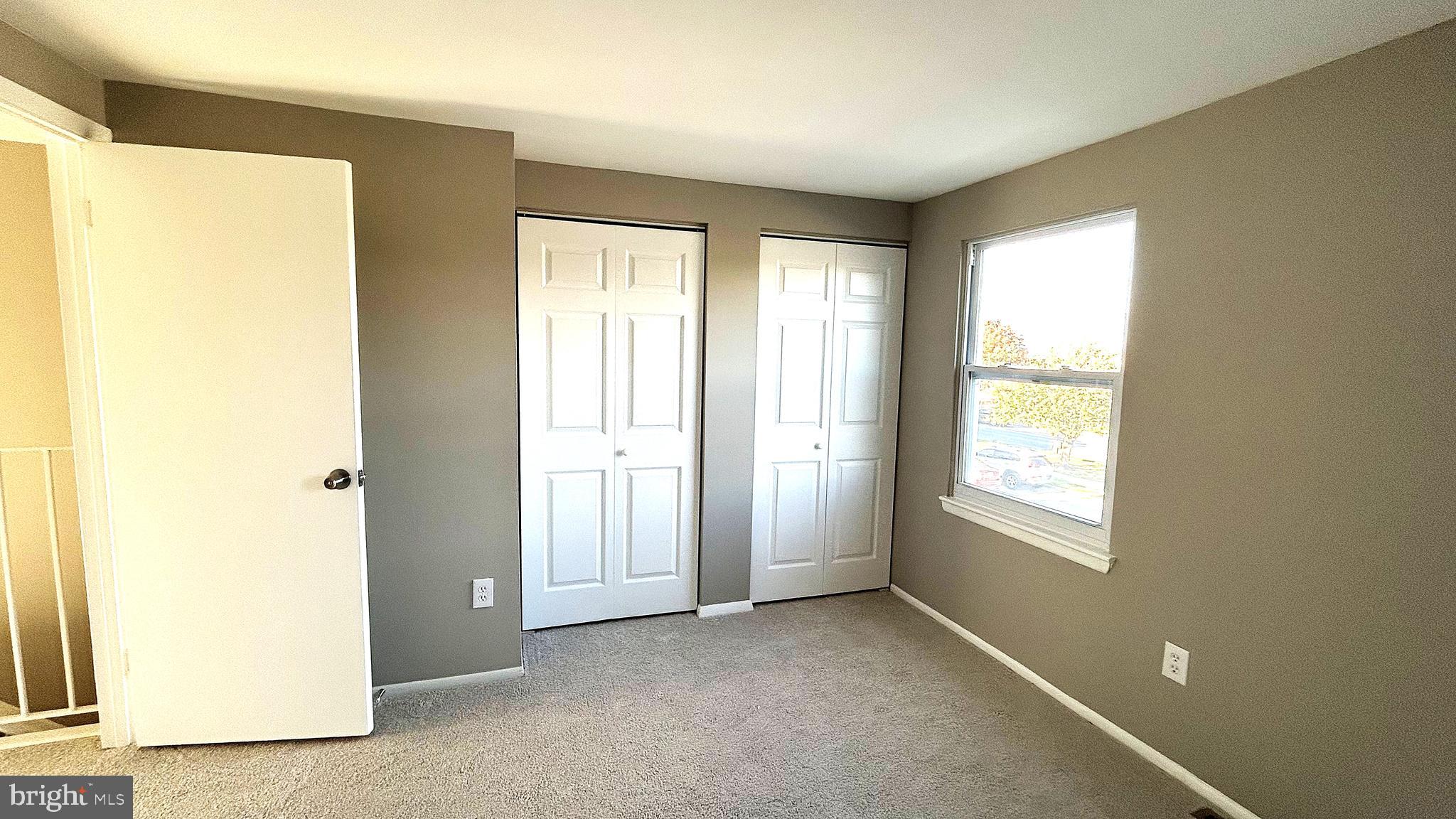 13 Consett Place, Unit 4H Frederick, MD 21703 - Photo 15 of 21 a view of an empty room with a window