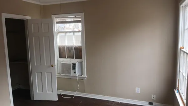 a bathroom with a toilet a sink and bathtub