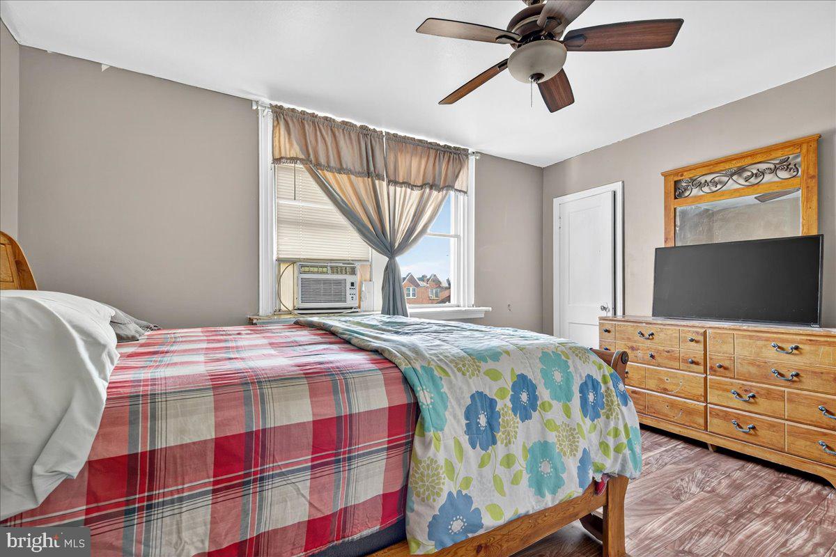 1440 Robbins Street Philadelphia, PA 19149 - Photo 18 of 31 a bedroom with a bed and a flat screen tv