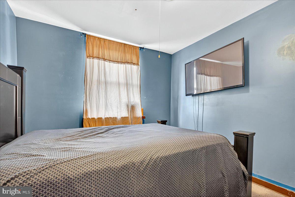 1440 Robbins Street Philadelphia, PA 19149 - Photo 22 of 31 a bedroom with a bed and a window