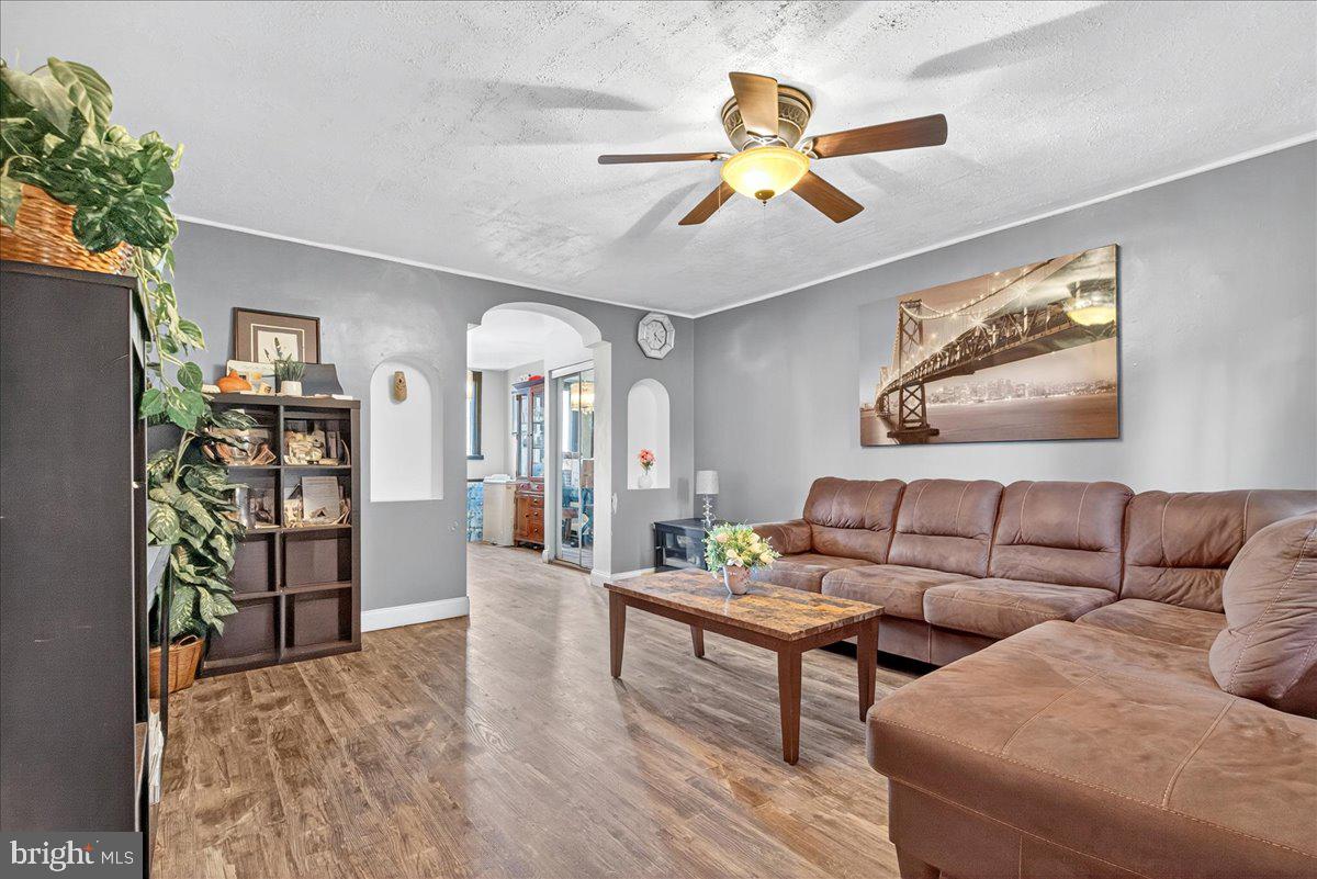 1440 Robbins Street Philadelphia, PA 19149 - Photo 10 of 31 a living room with furniture and a bookshelf