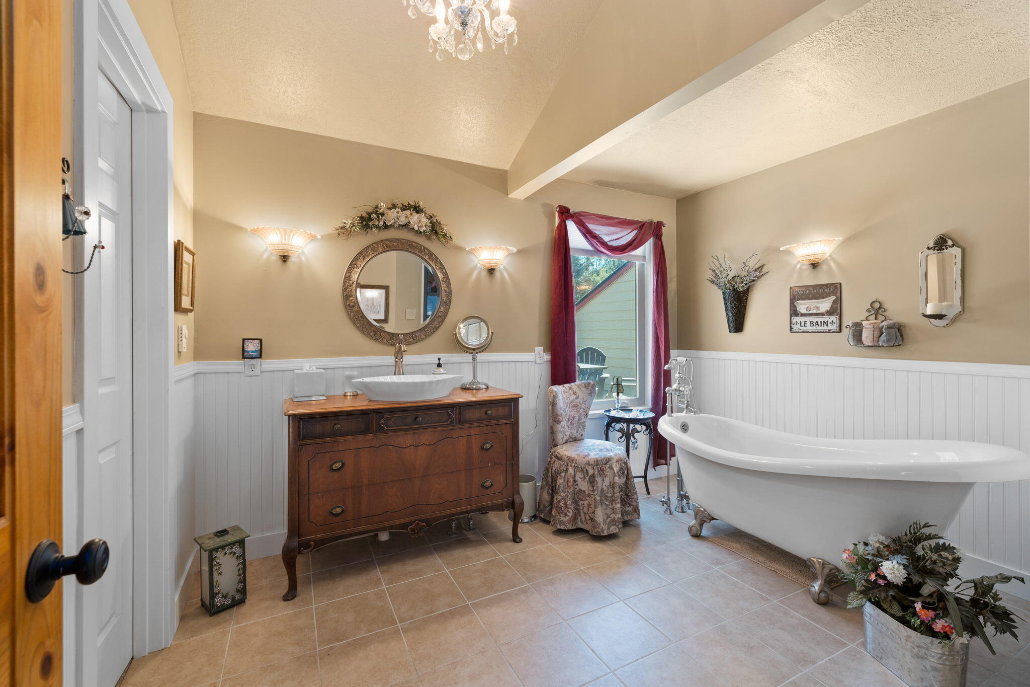 21870 Rincon Avenue Bend, OR 97702 - Photo 24 of 47 Second Primary Suite Bath, complete with claw foot bath and antique side table wash stand.