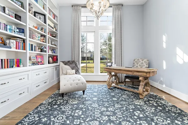 a living room with furniture and decor