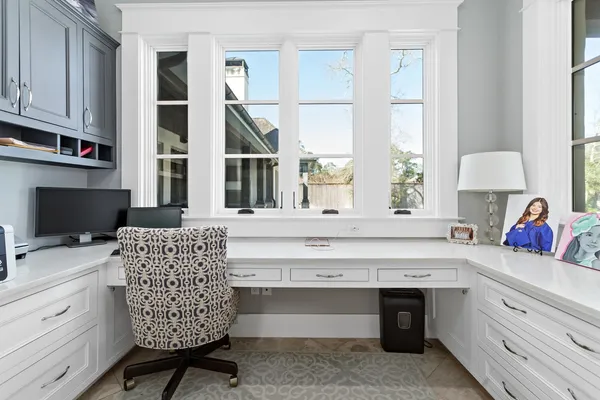 a kitchen with a stove a sink and a refrigerator