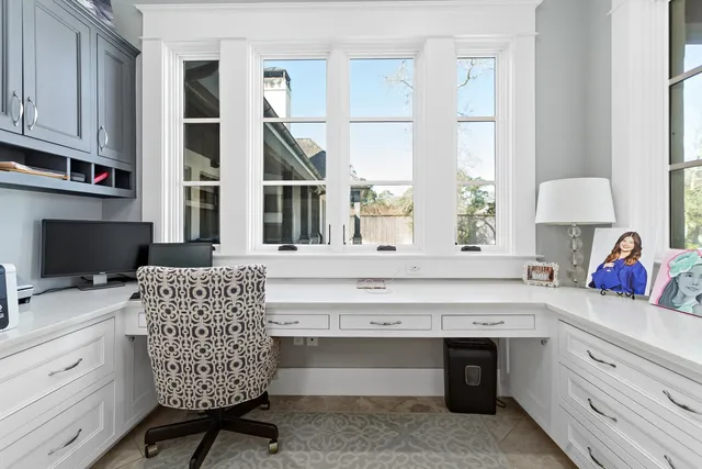 a kitchen with a stove a sink and a refrigerator