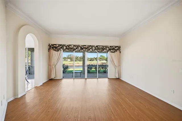 a view of a livingroom with wooden floor