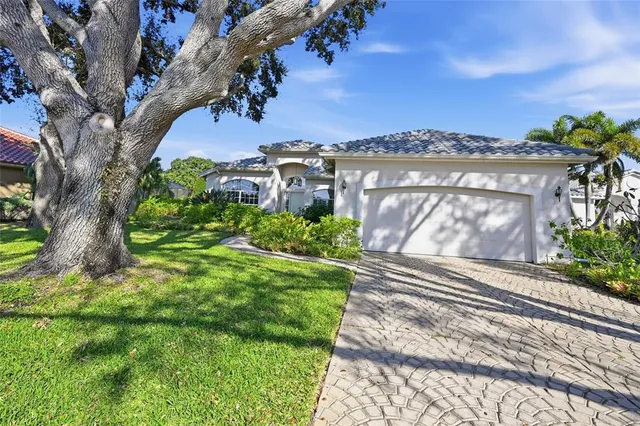 an aerial view of a houses with outdoor space