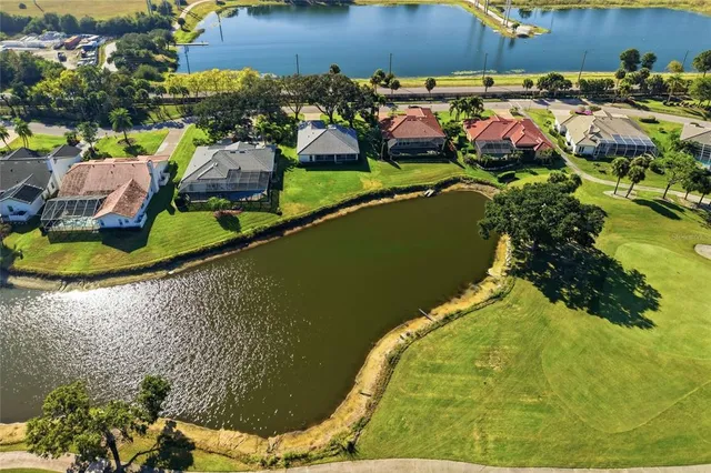 a view of a swimming pool with lounge chair