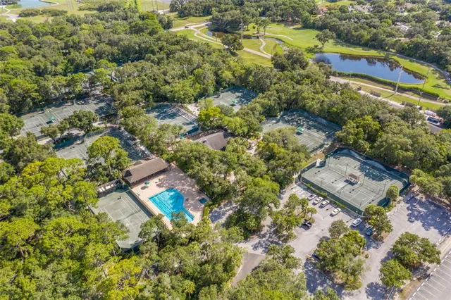 a view of yard with grass and trees