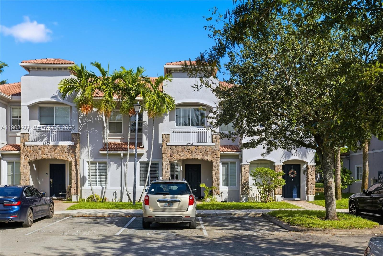 8231 Southwest 29th Street Miramar, FL 33025 - Photo 19 of 53 a front view of a building with garden