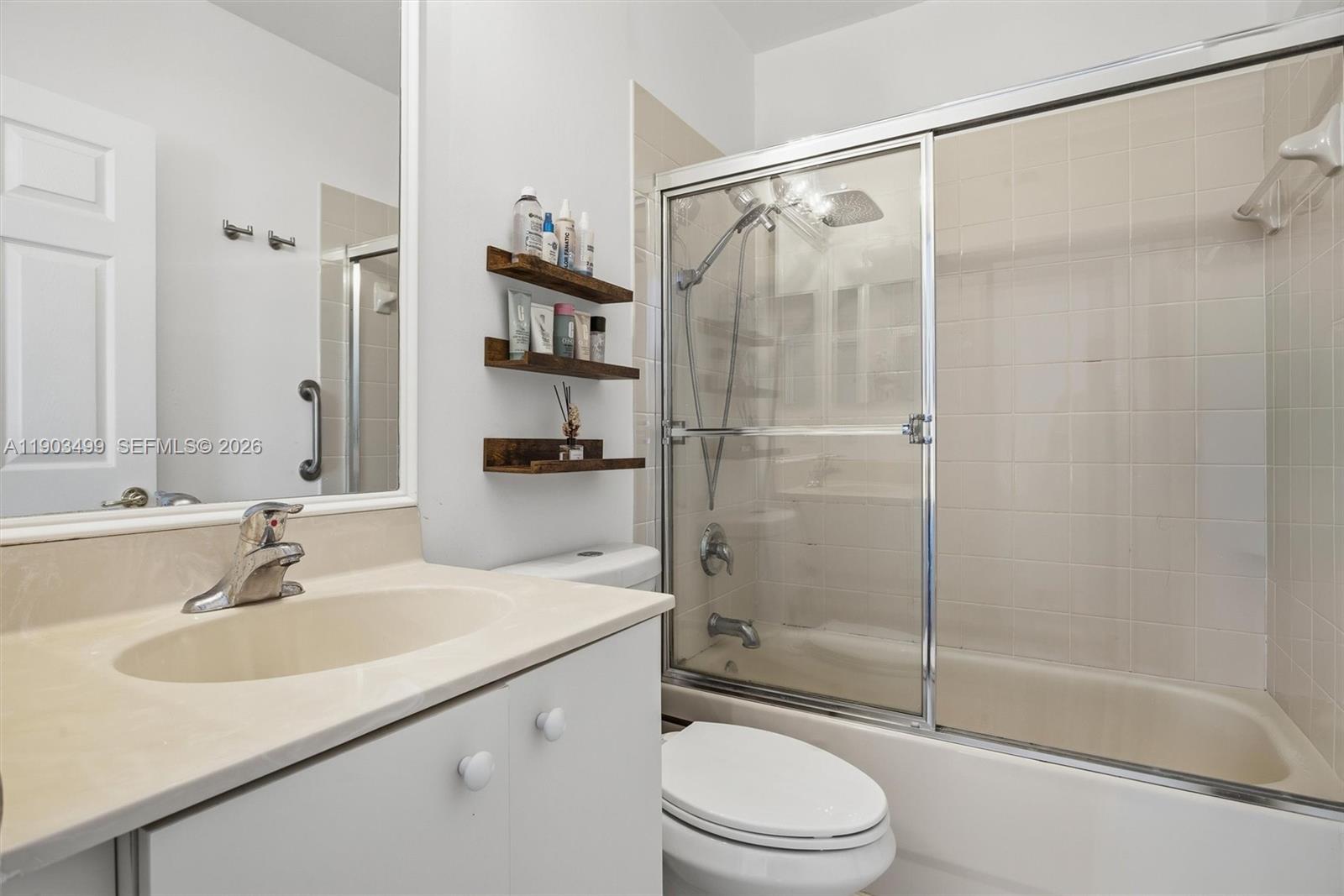 8231 Southwest 29th Street Miramar, FL 33025 - Photo 35 of 53 a bathroom with a sink toilet and shower