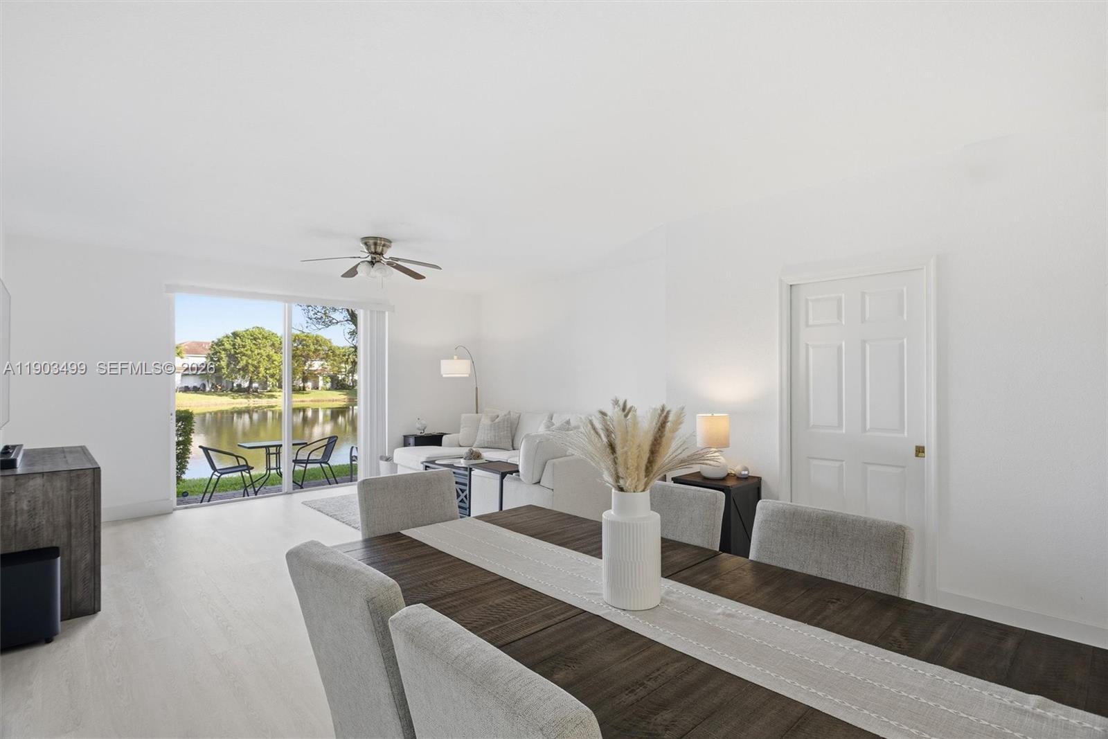 8231 Southwest 29th Street Miramar, FL 33025 - Photo 6 of 53 a living room with furniture and a large window