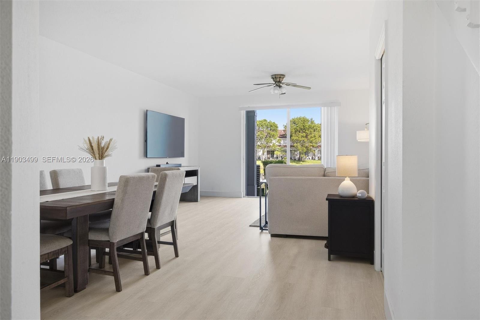 8231 Southwest 29th Street Miramar, FL 33025 - Photo 7 of 53 a dining room with furniture and a window
