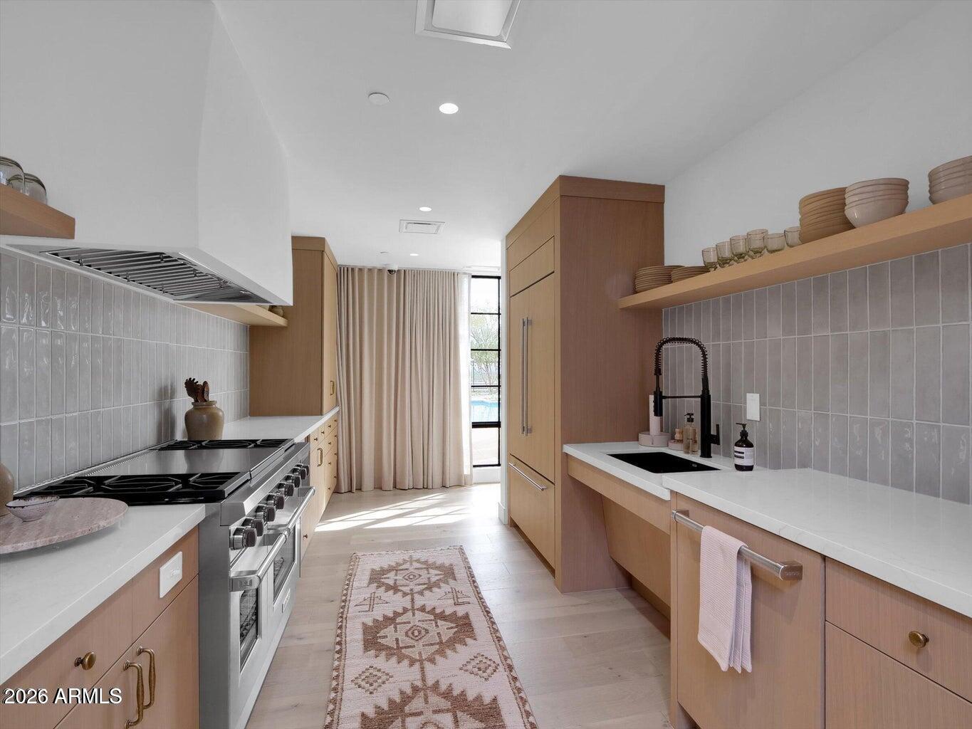 4849 North Camelback Ridge Road, Unit B104 Scottsdale, AZ 85251 - Photo 14 of 17 Clubhouse Kitchen