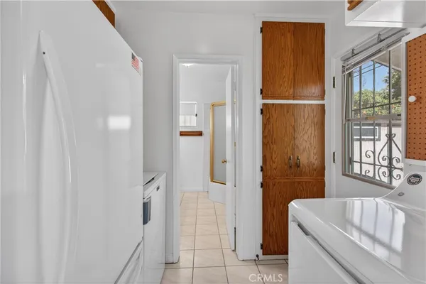 a bathroom with a sink a mirror and vanity