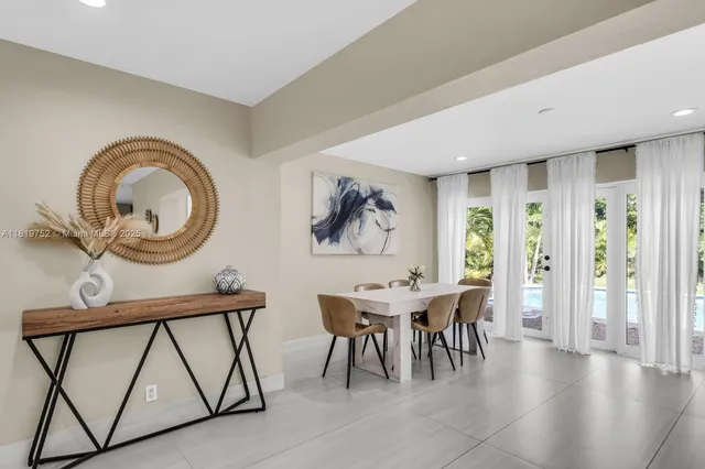 a view of a livingroom with furniture and front door