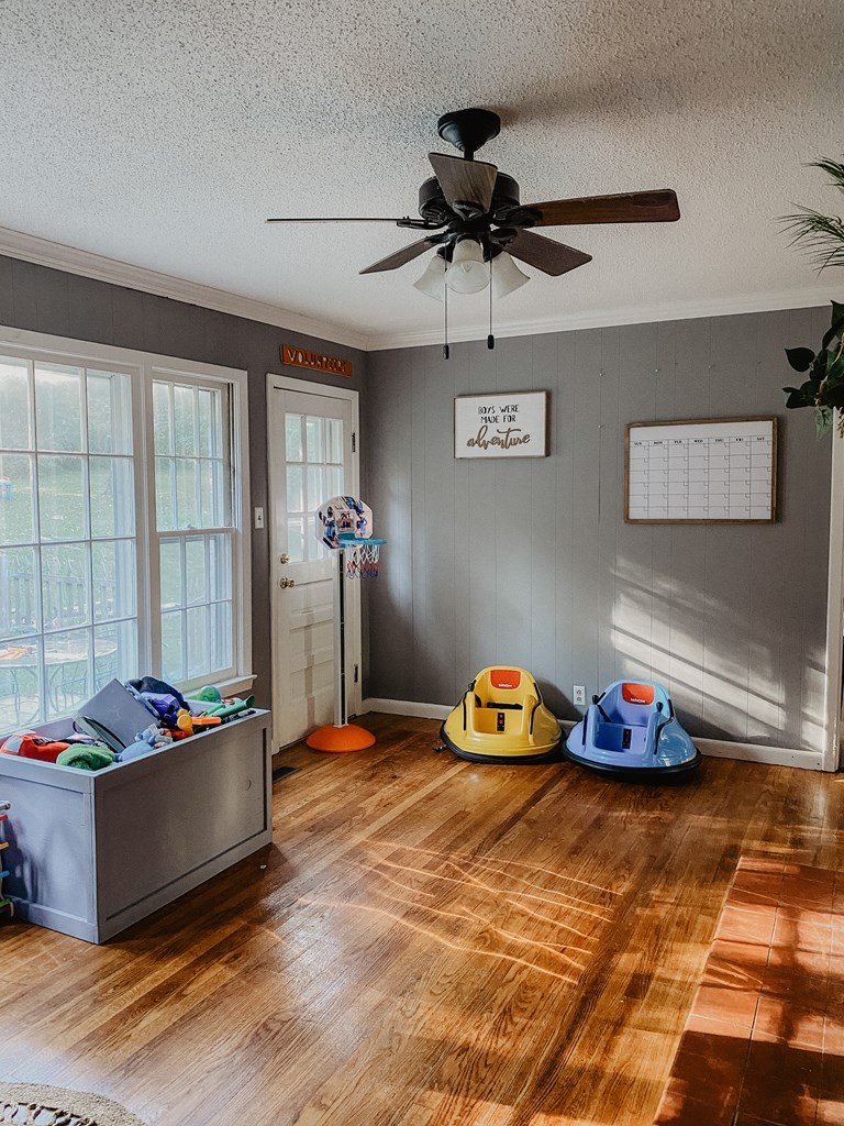 173 Magnolia Street Camden, TN 38320 - Photo 18 of 22 a bedroom with a bed and a window
