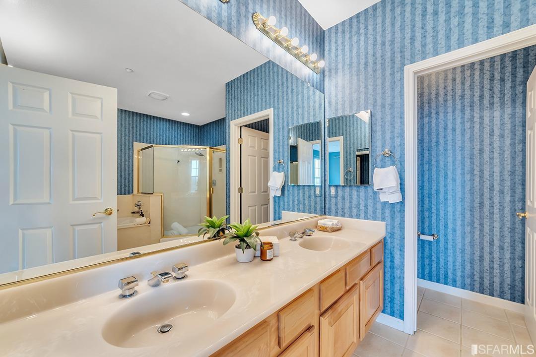 360 Goodwin Drive San Bruno, CA 94066 - Photo 17 of 43 a bathroom with a sink and a mirror