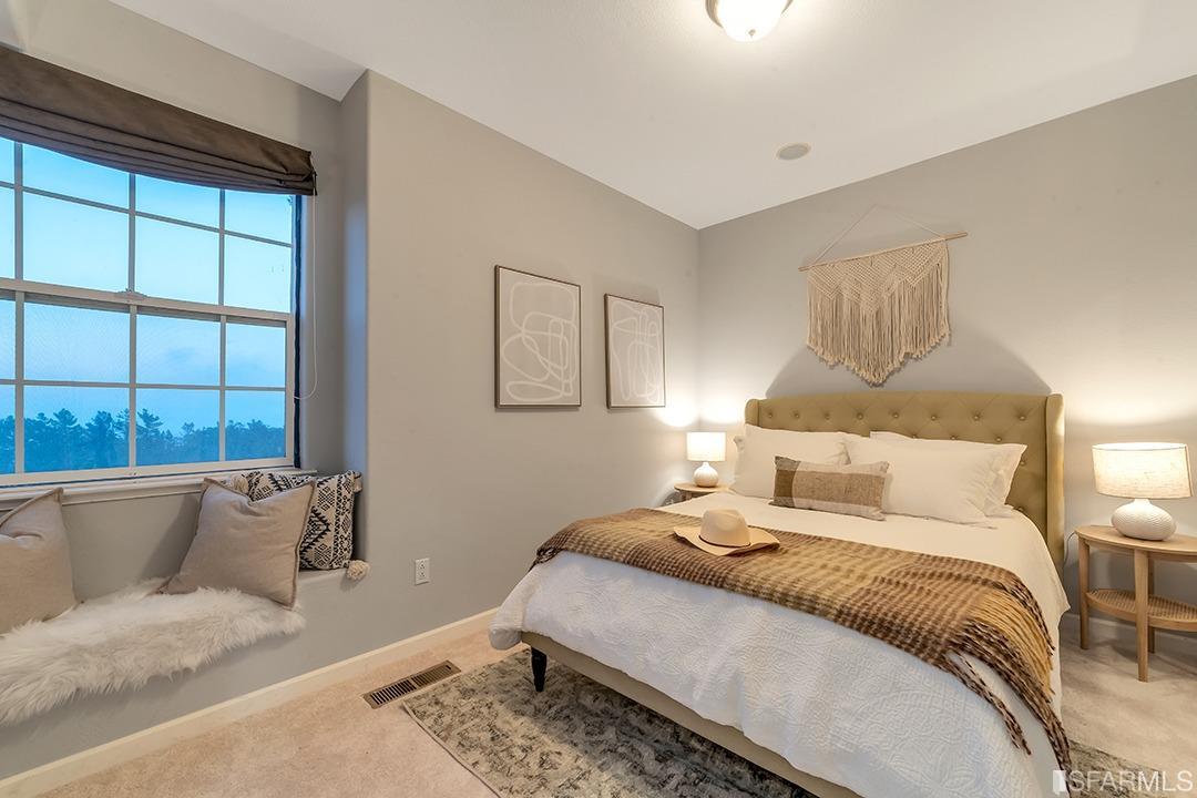 360 Goodwin Drive San Bruno, CA 94066 - Photo 36 of 43 a bedroom with a large bed and a window