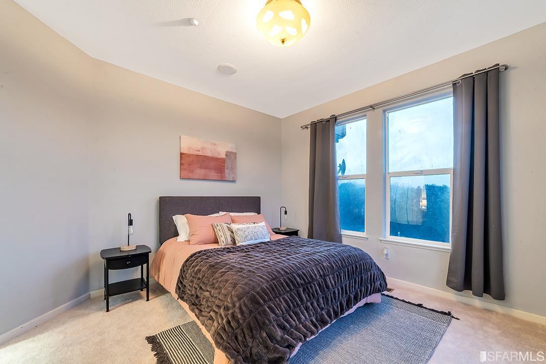 360 Goodwin Drive San Bruno, CA 94066 - Photo 37 of 43 a bedroom with a large bed and a large window