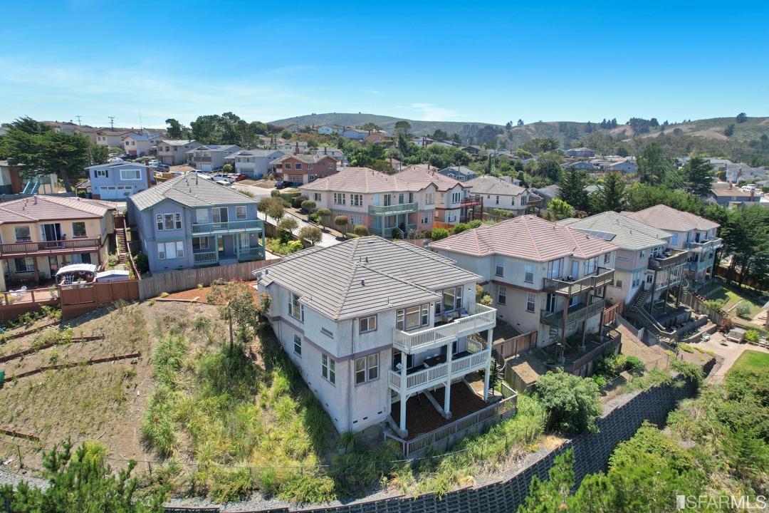 360 Goodwin Drive San Bruno, CA 94066 - Photo 42 of 43 a aerial view of a residential apartment building with a yard